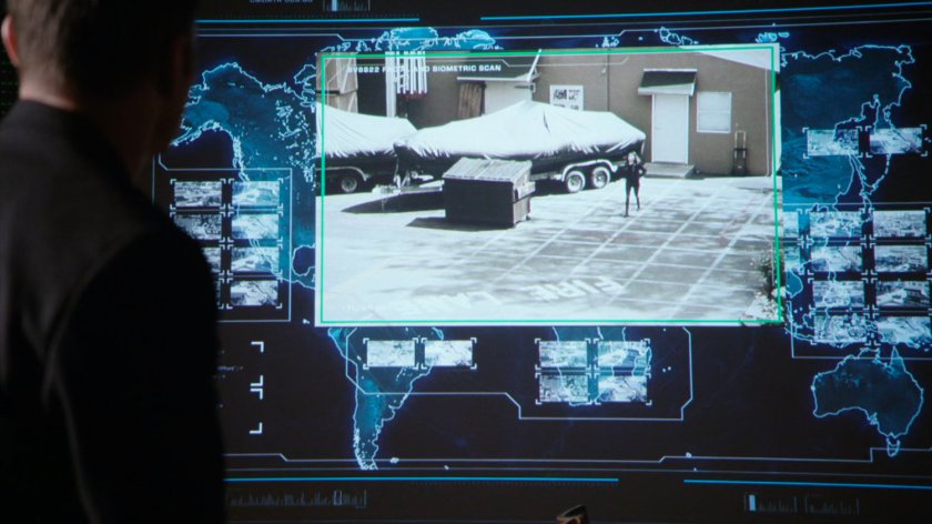 Surveillance screen tracking people around Union City.