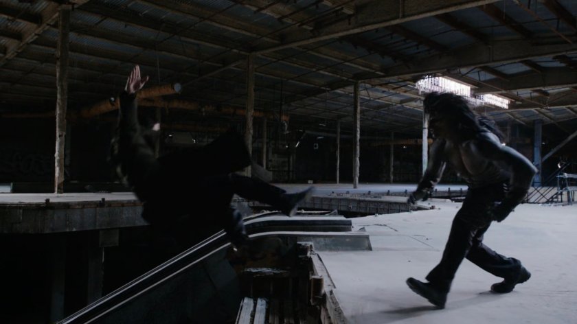 Hive fighting Lash inside abandoned mall.