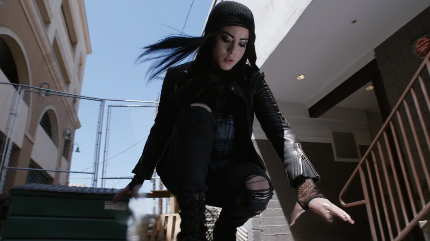 Daisy kneeling in an alley and channeling her powers.