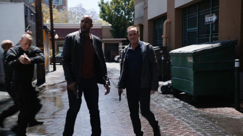 Mack and Coulson in an alley, missing Daisy.