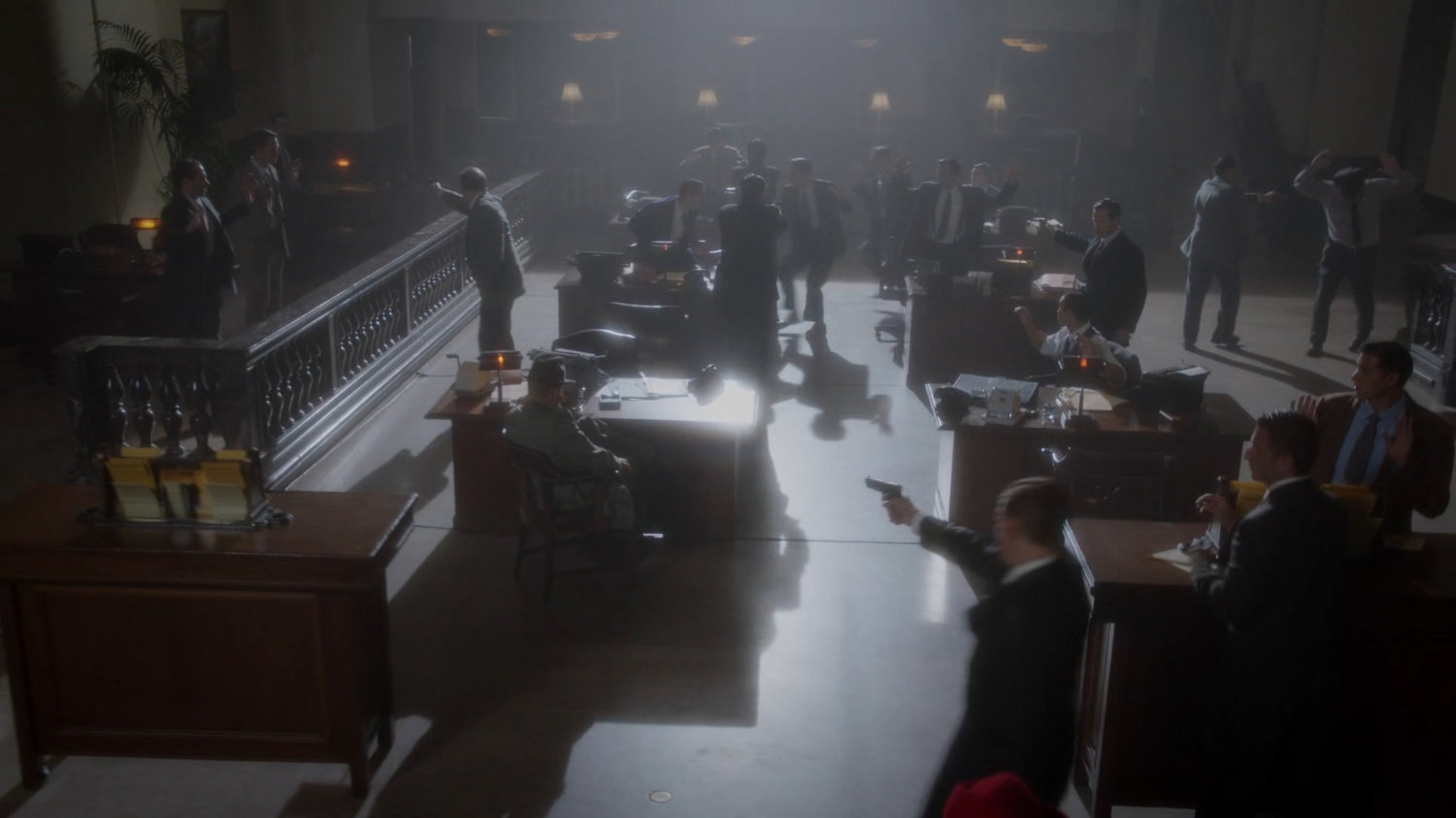 SSR Agents holding guns on robbers inside Bowery Savings Bank.