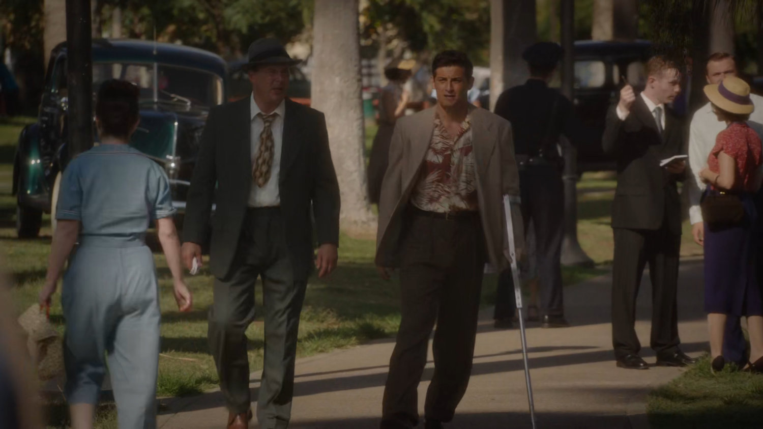 Detective Henry and Chief Daniel Sousa walk through Echo Park.