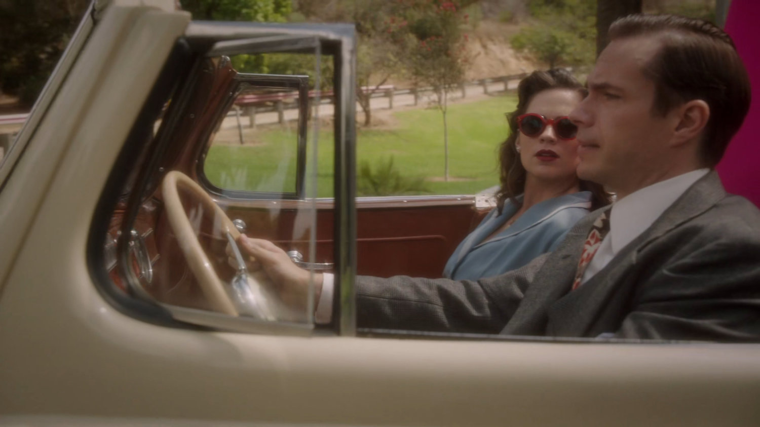 Jarvis drives Peggy along a Los Angeles road.