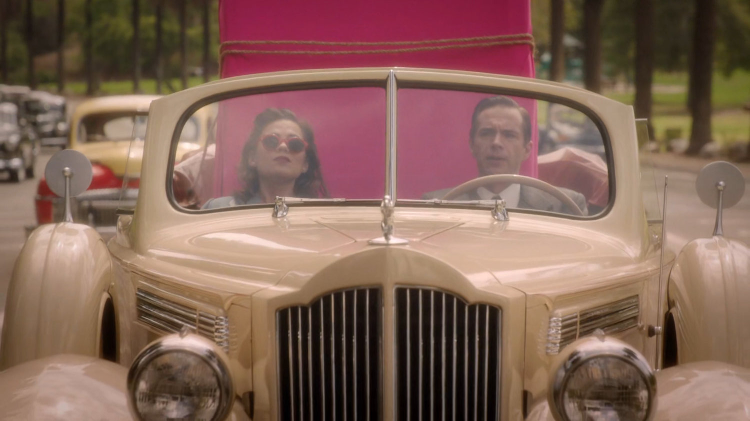 Jarvis drives Peggy along a Los Angeles road.