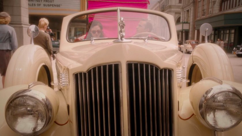 Peggy and Jarvis in car in front of the Auerbach Theatrical Agency