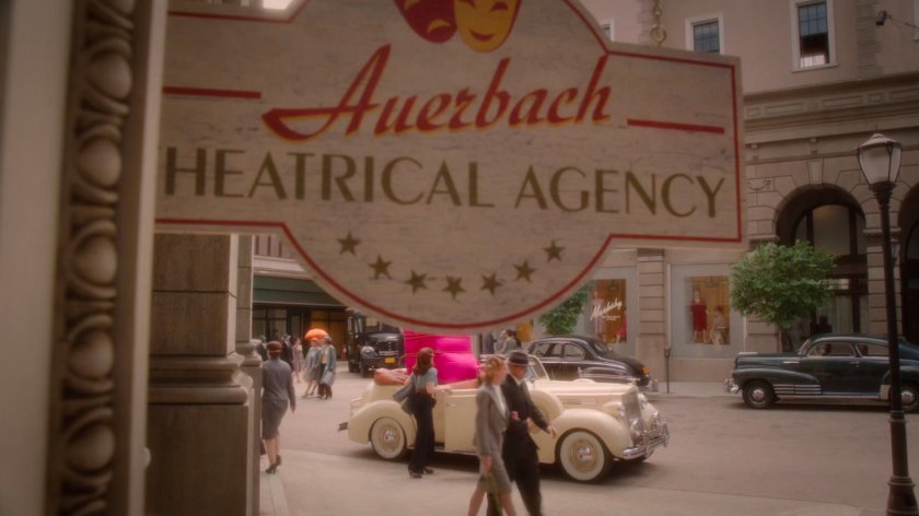 Peggy and Jarvis in car in front of the Auerbach Theatrical Agency