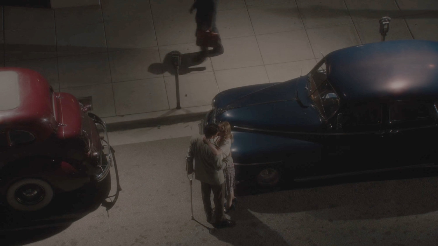 High angle view of Sousa and a woman on a Los Angeles street.