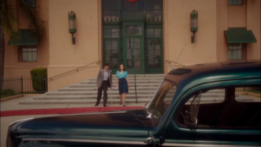 Peggy and Sousa on steps in front of Isodyne Energy building.