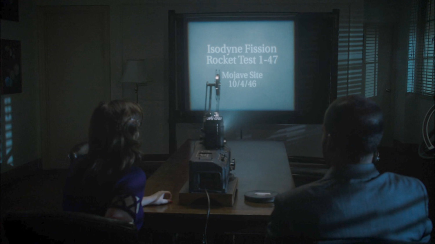 Peggy and Jason watching Isodyne Energy film reel.