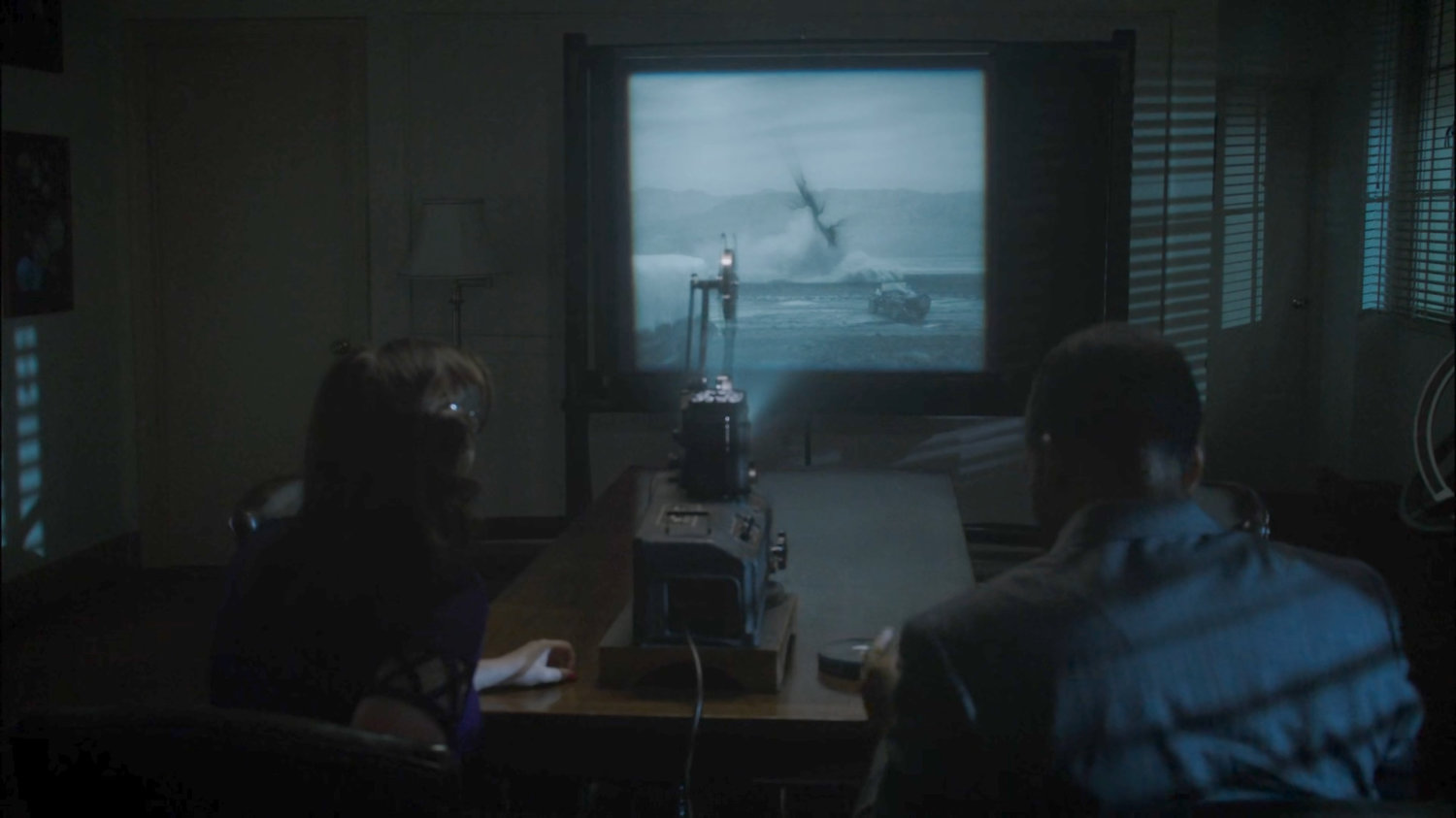 Peggy and Jason watching Isodyne Energy film reel.