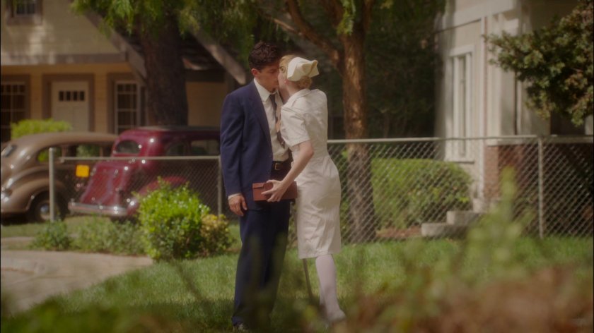 Sousa and Violet kiss outside his house.
