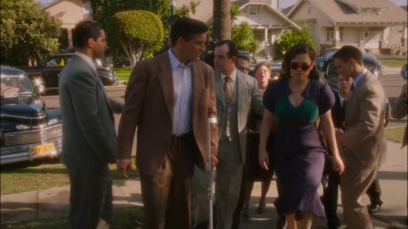 Sousa and Peggy walking towards Jason Wilkes house.