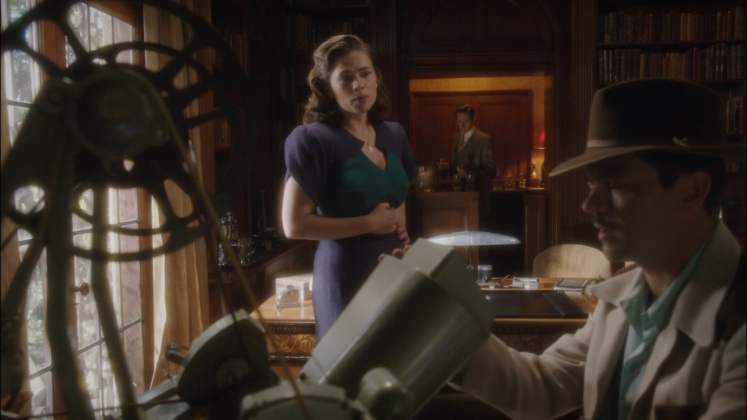 Peggy and Howard Stark in his office at Stark Pictures.