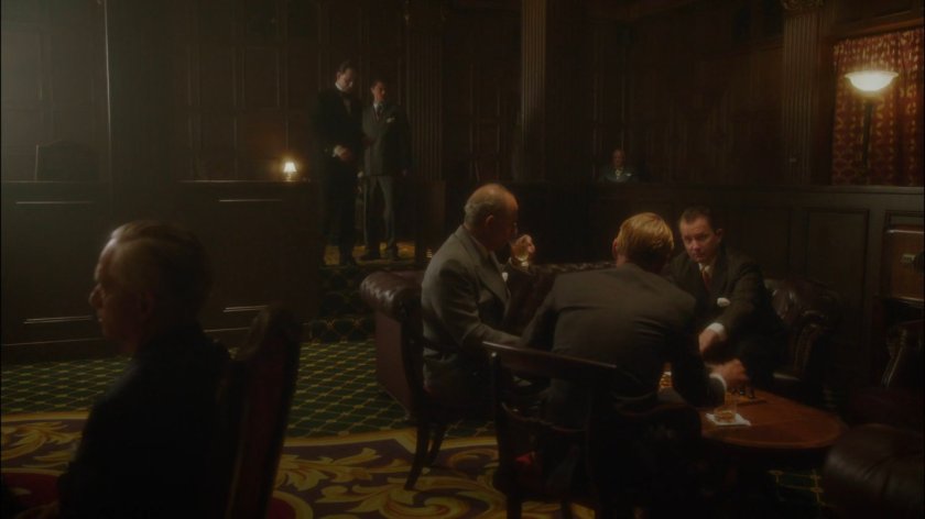 Men gathered in the Arena Club.