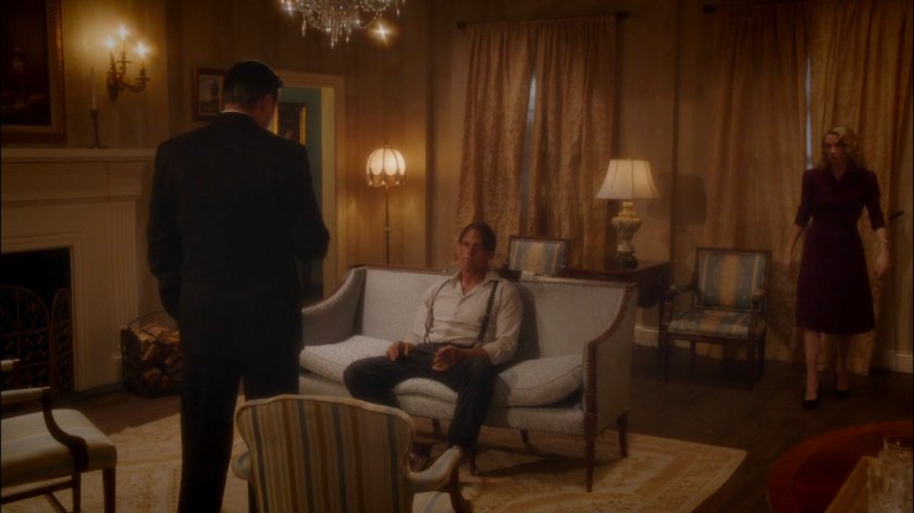 Rufus Hunt with Calvin and Whitney in their living room.