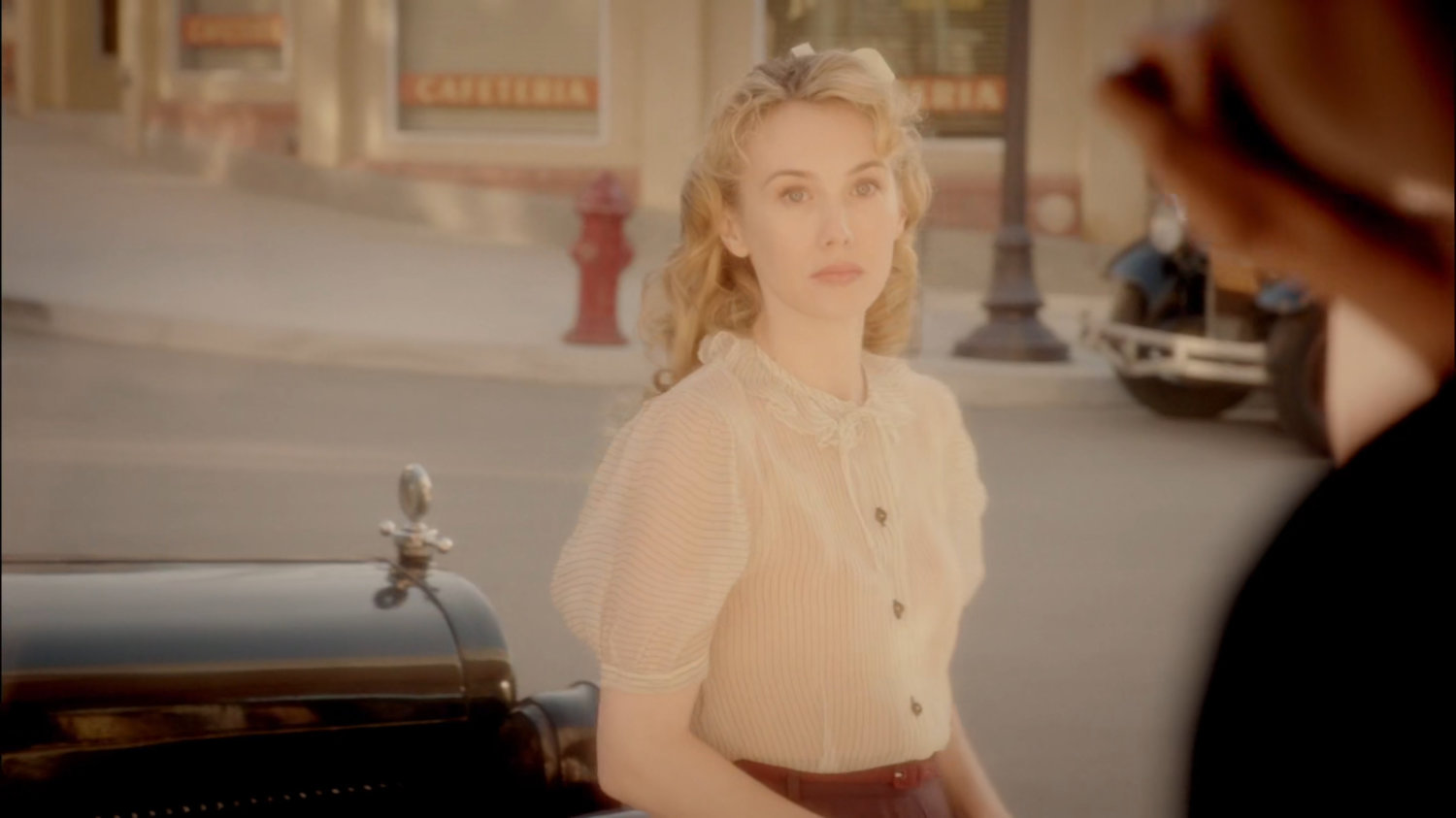 Agnes Cully outside Hollywood movie theater.