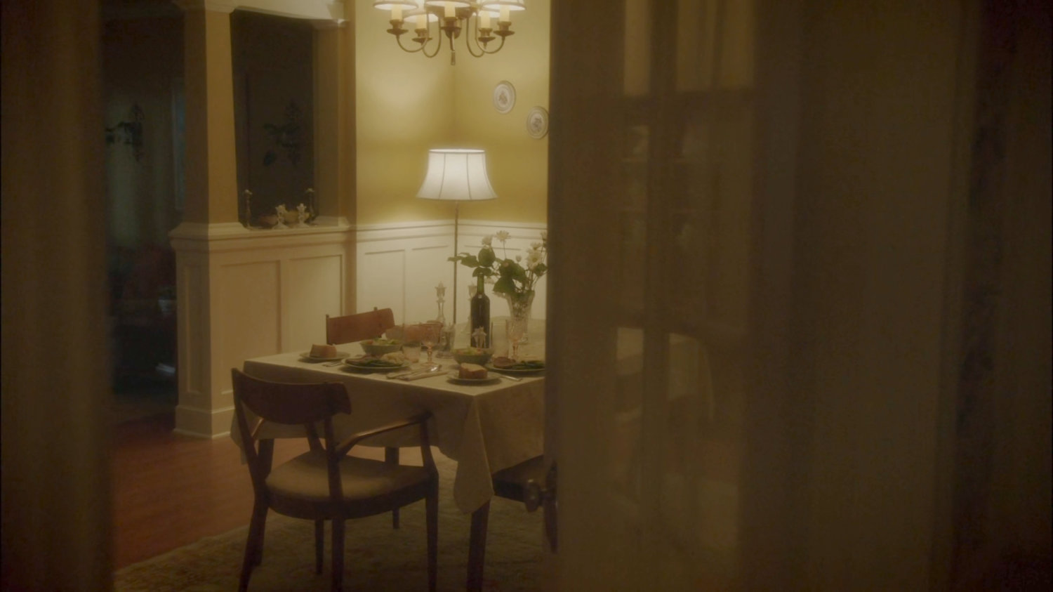 Violet's POV into her dining room.