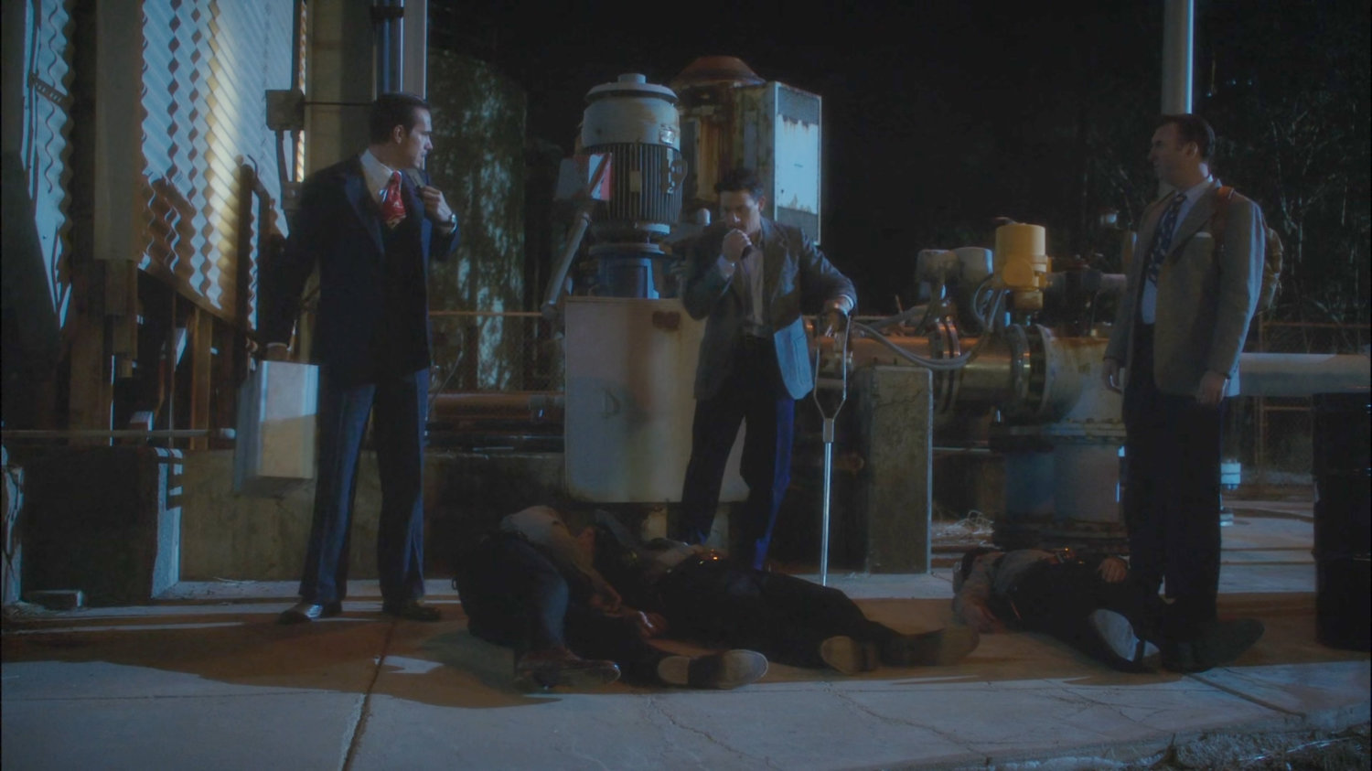 Jarvis, Sousa, and Samberly standing over unconscious guards outside Roxxon warehouse.