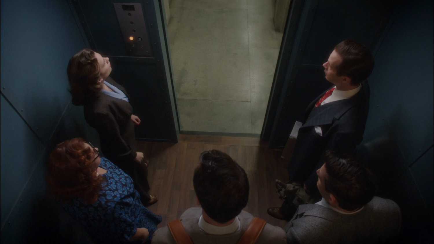 Peggy, Rose, Samberly, Sousa, and Jarvis in elevator at Roxxon warehouse.