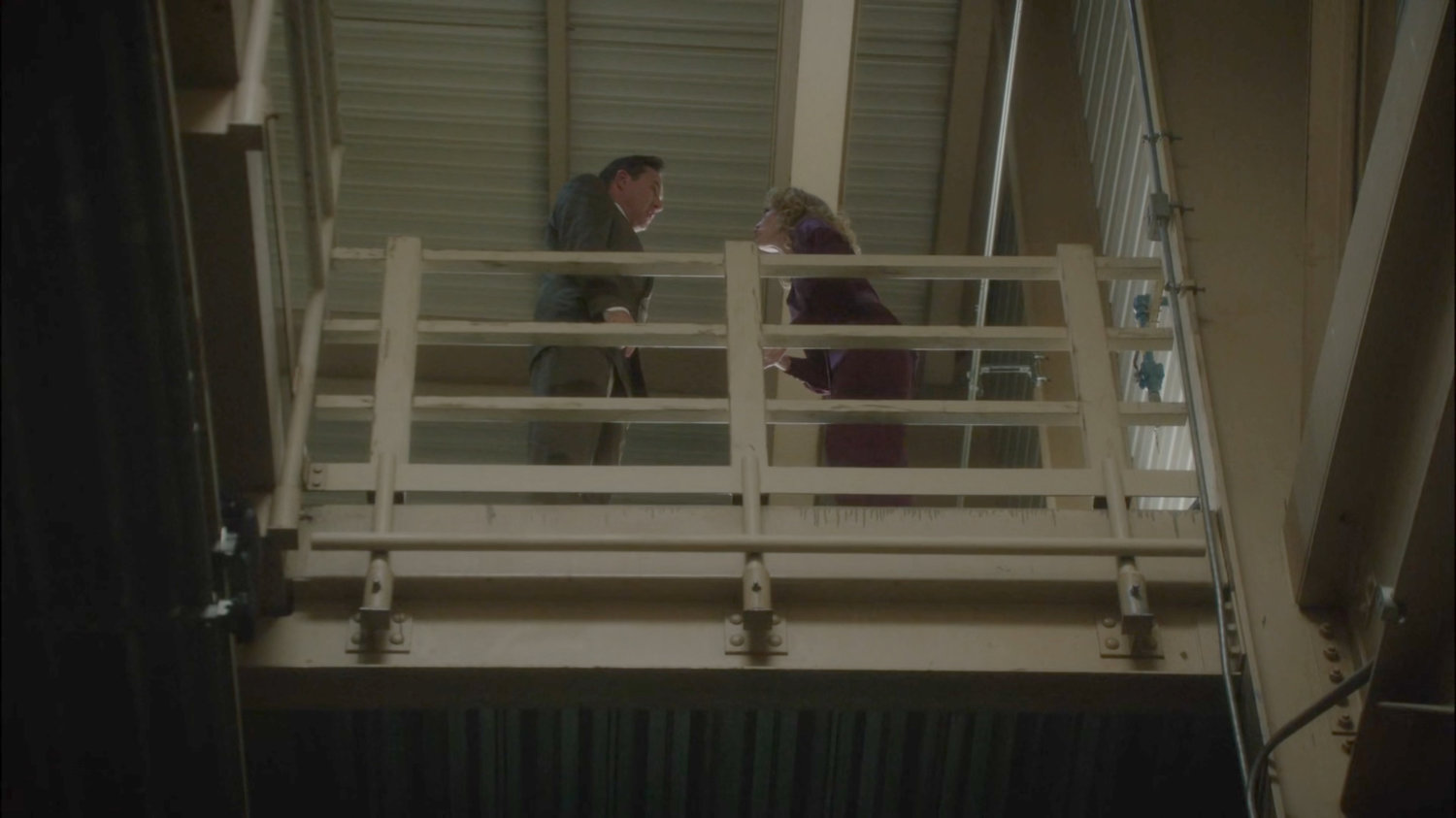 Calvin and Whitney arguing in the Roxxon Warehouse.