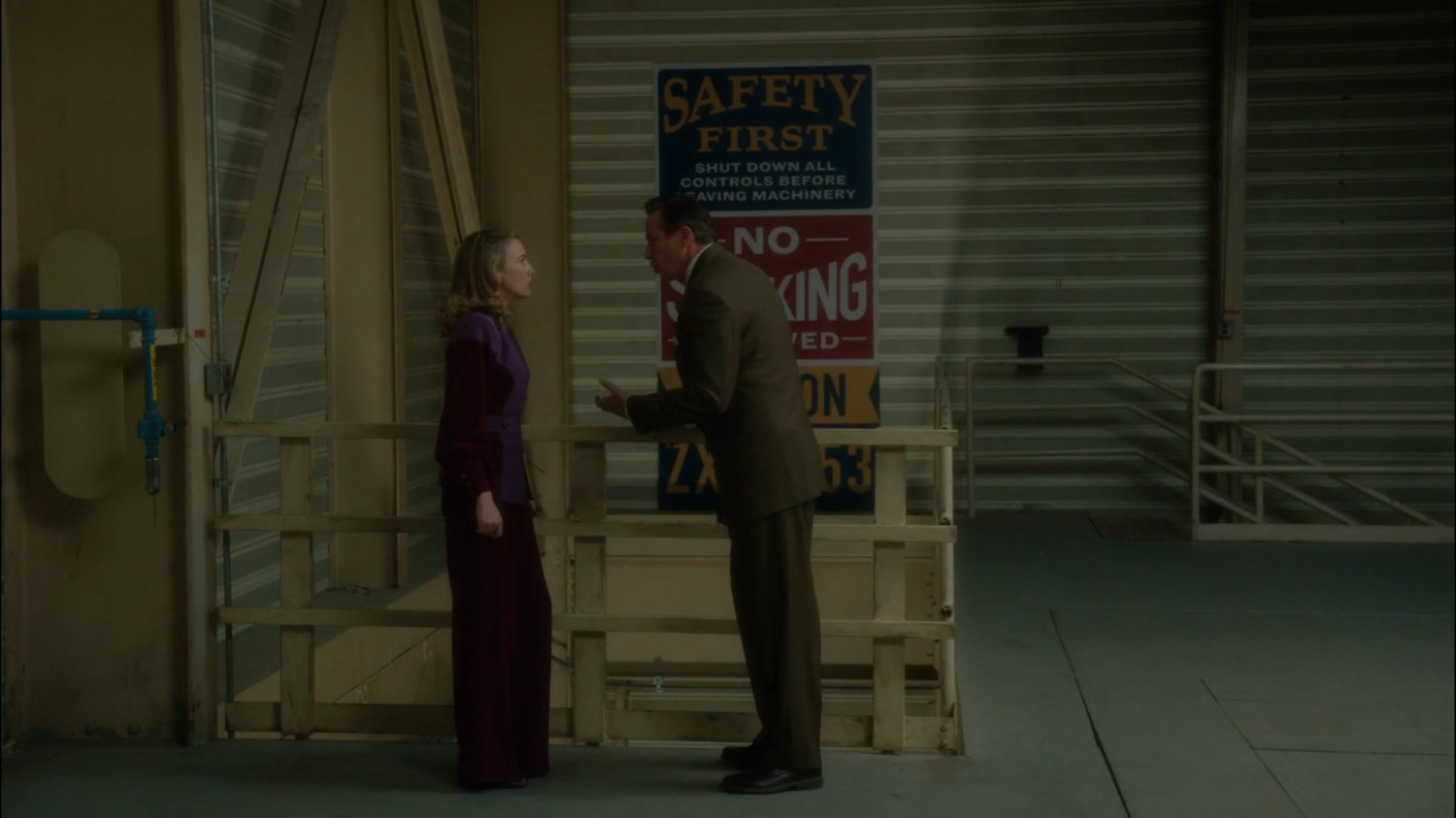 Calvin and Whitney arguing in the Roxxon Warehouse.