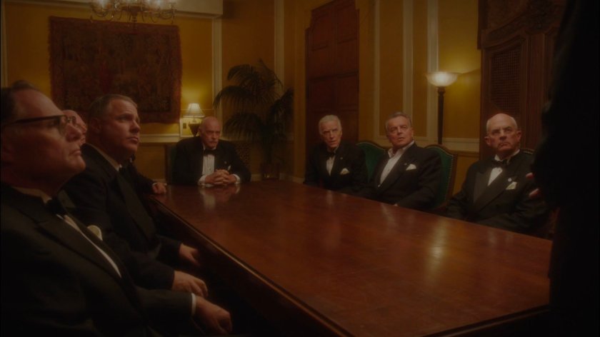 The Council of Nine meeting in meeting room in the MacArthur Grand Hotel.