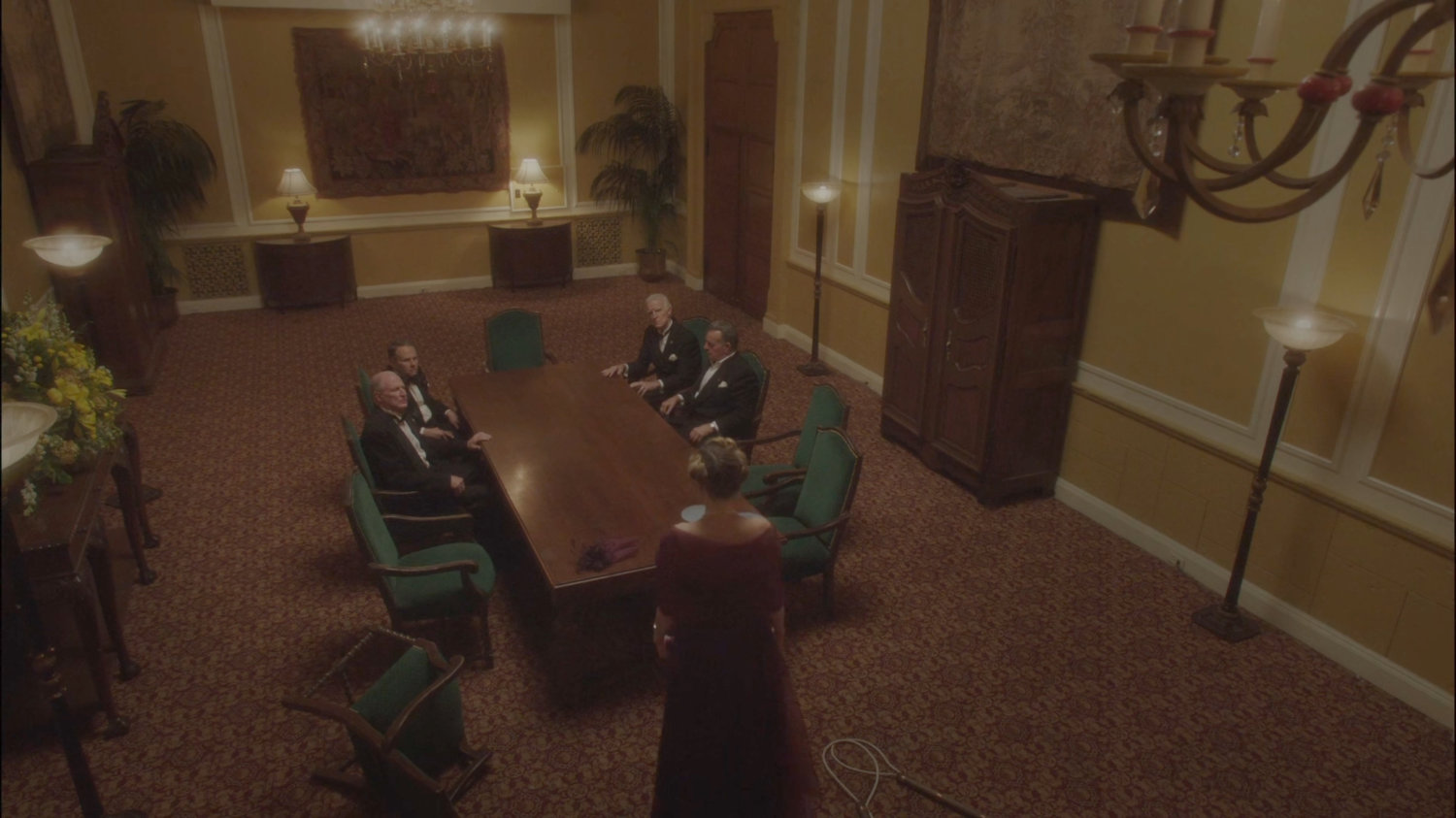 Whitney and the Council of Nine meeting in meeting room in the MacArthur Grand Hotel.