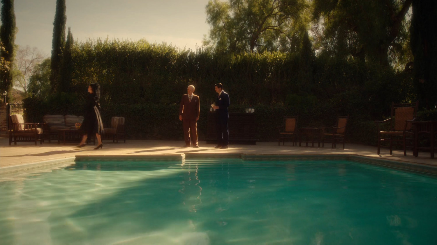 Vernon and Joseph Manfredi by pool of Chadwick Ranch.