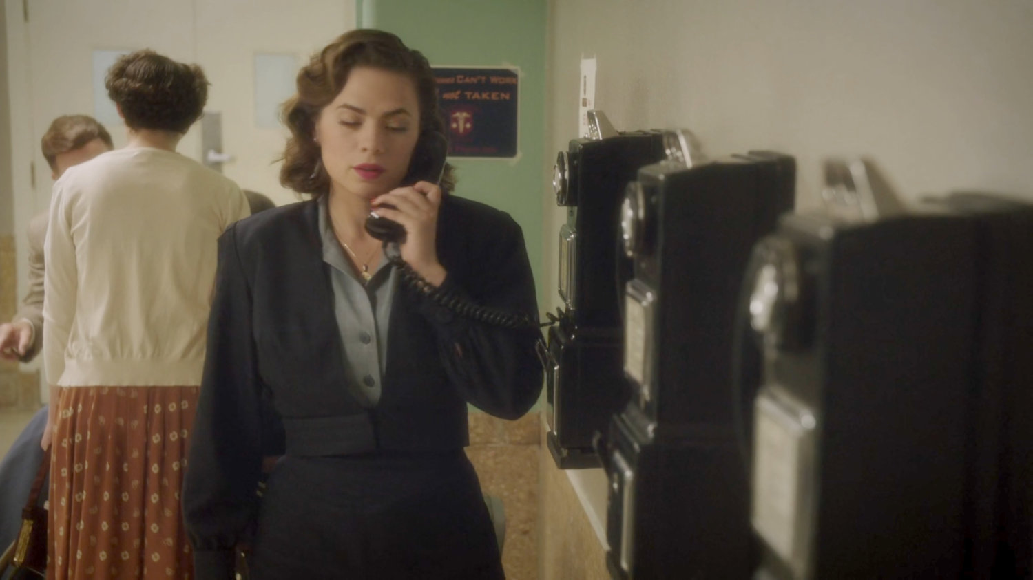 Peggy on a pay phone inside Waverly Memorial Hospital.