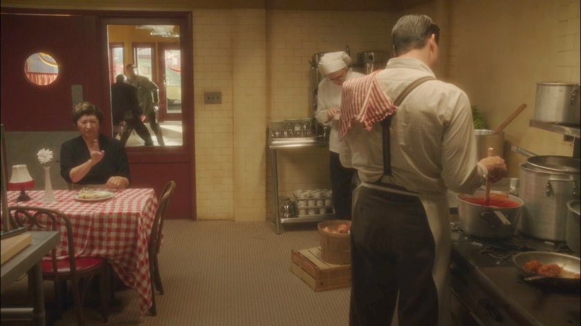 Joseph cooking in the kitchen of Palizzi's restaurant.