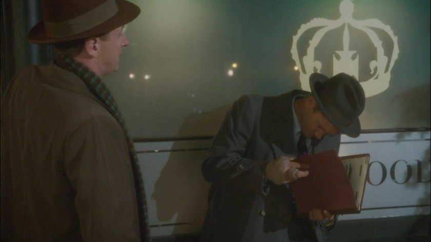 Thompson with a redacted dossier, and Nick Driscoll outside a pub in London.