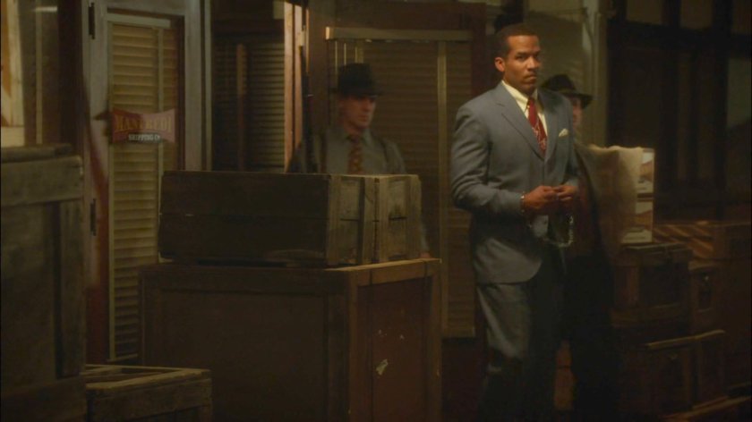 Jason and two thugs in the Manfredi Shipping Warehouse.