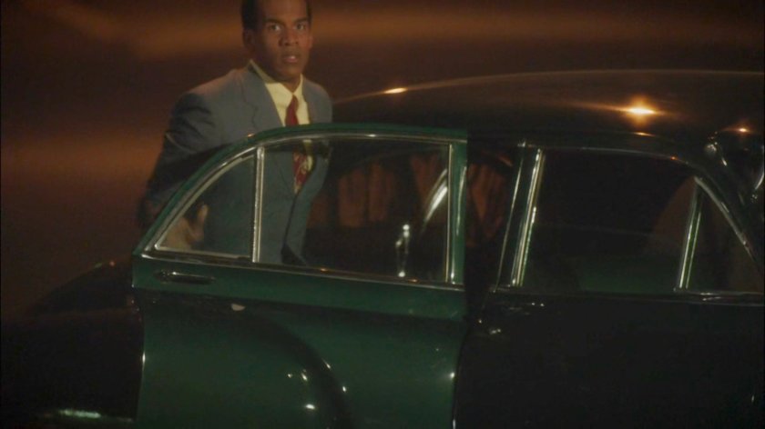 Jason Wilkes getting into Manfredi's car at night.