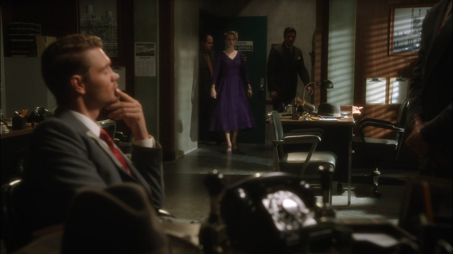 Thompson waiting for Whitney and Joseph in Manfredi Waste Management facility office.