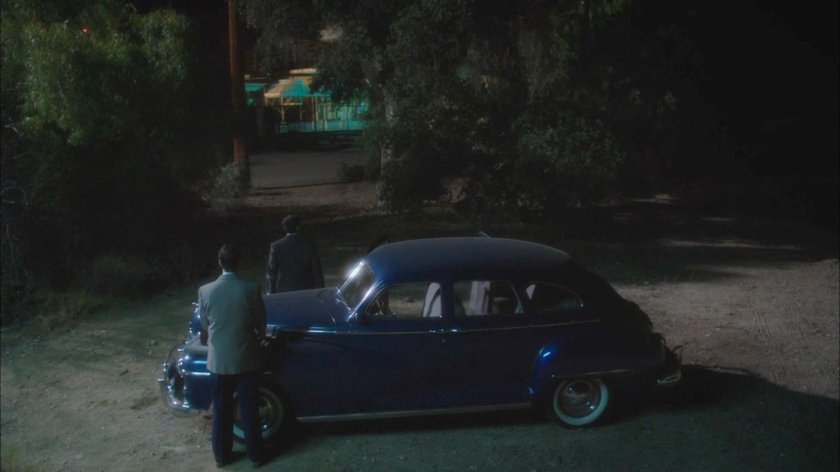 Samberly and Sousa by car outside Manfredi Waste Management facility.