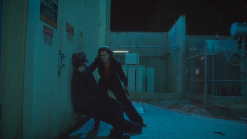 Peggy knocking out guard outside Manfredi Waste Management facility.