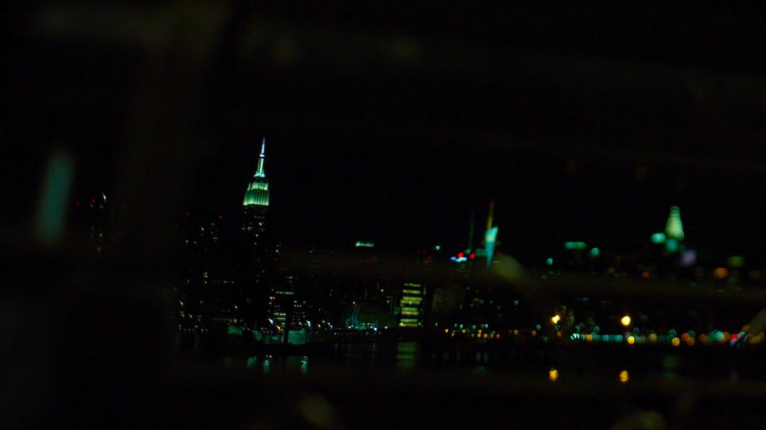 View of Manhattan skyscrapers at night.