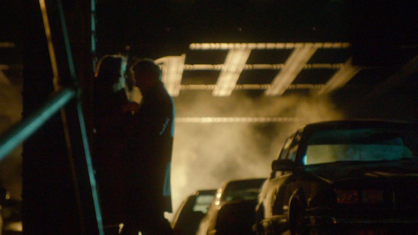 Couple in flagrante delicto under bridge.