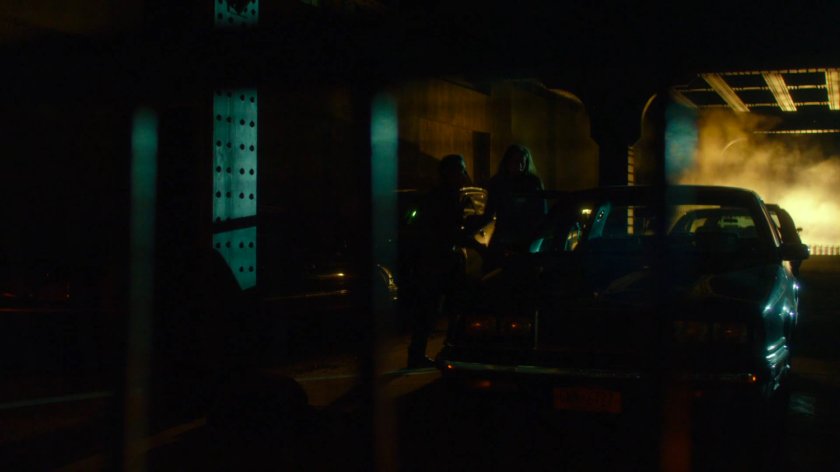 Couple in flagrante delicto under bridge.