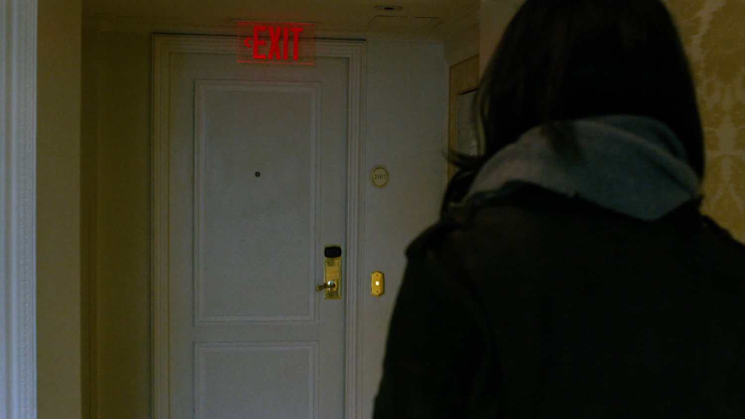Jessica in a fancy hotel hallway.