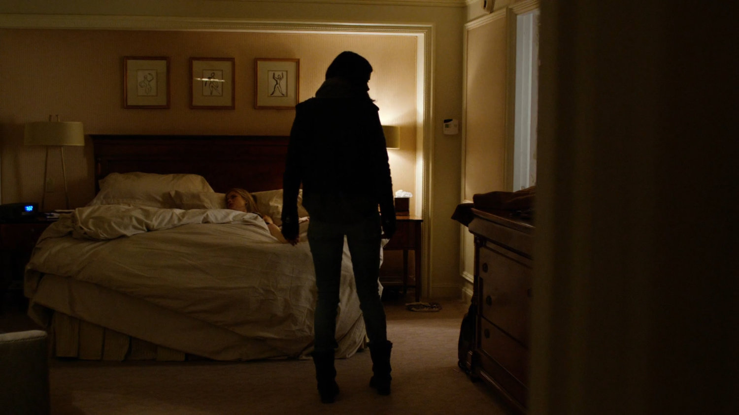 Jessica in a fancy hotel room.