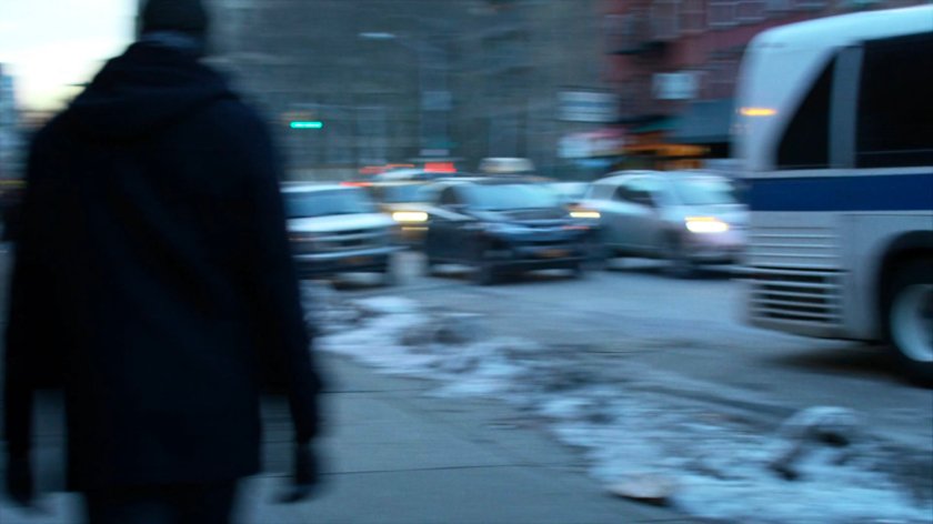 Jessica's POV of a bus turning corner.