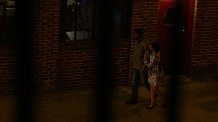 Luke and Gina walking out of his bar.