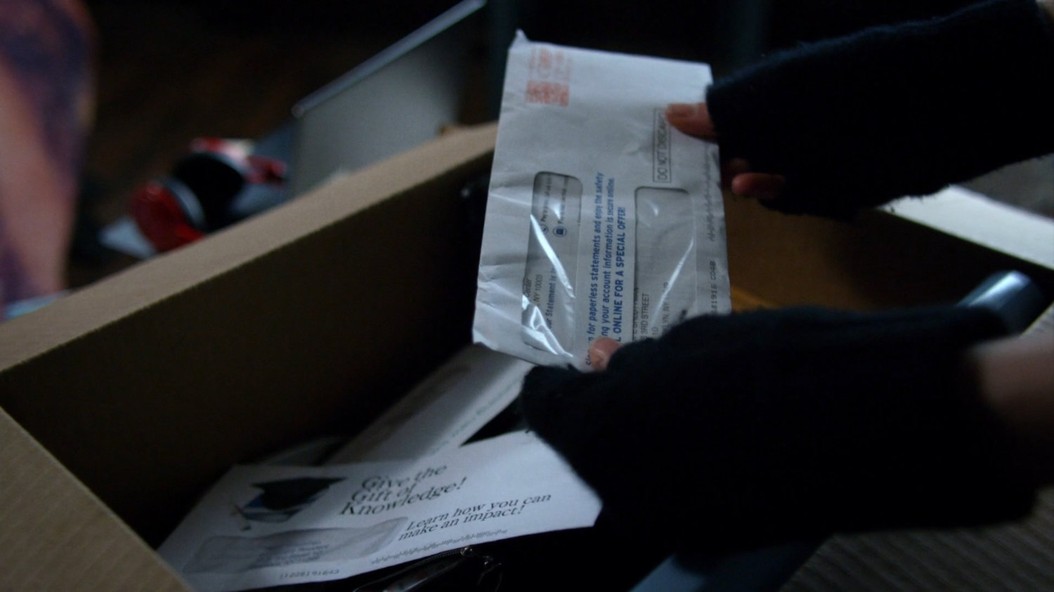 Jessica looking at mail for Hope.