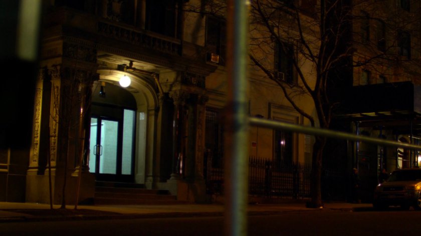 Nighttime view of front entrance to Alias Investigations building.