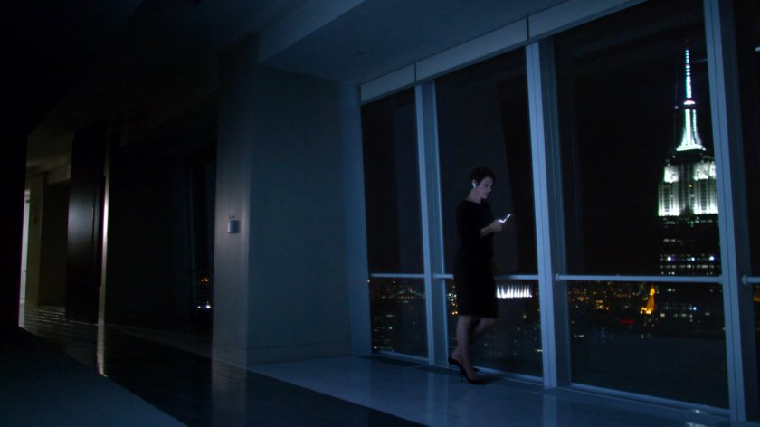 Jeri on phone with Jessica at Hogarth, Chao, & Benowitz, nighttime.