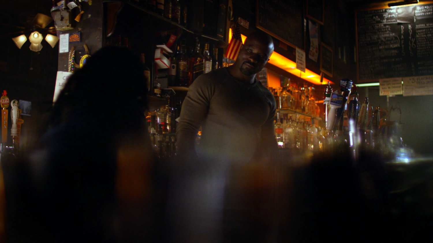 Jessica and Luke inside his bar.