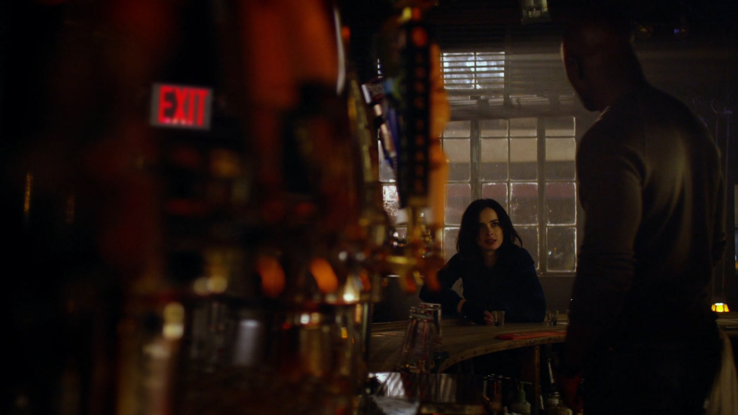 Jessica and Luke inside his bar.