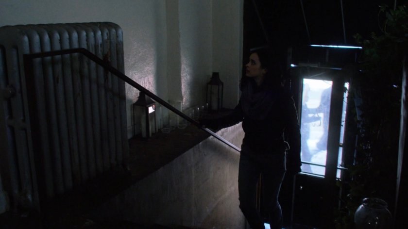 Jessica walking up stairs inside Niku Japanese restaurant.