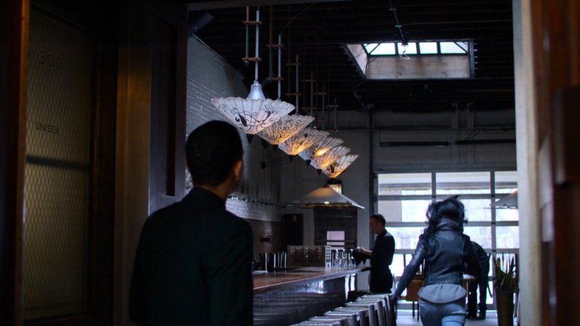 Jessica running out of Niku Japanese restaurant.